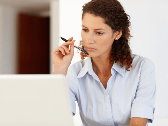 woman doing research on a computer